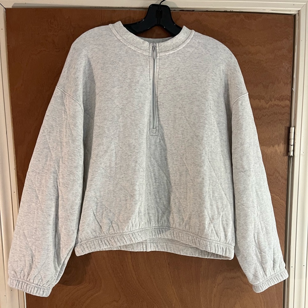 Woman’s old navy sweater